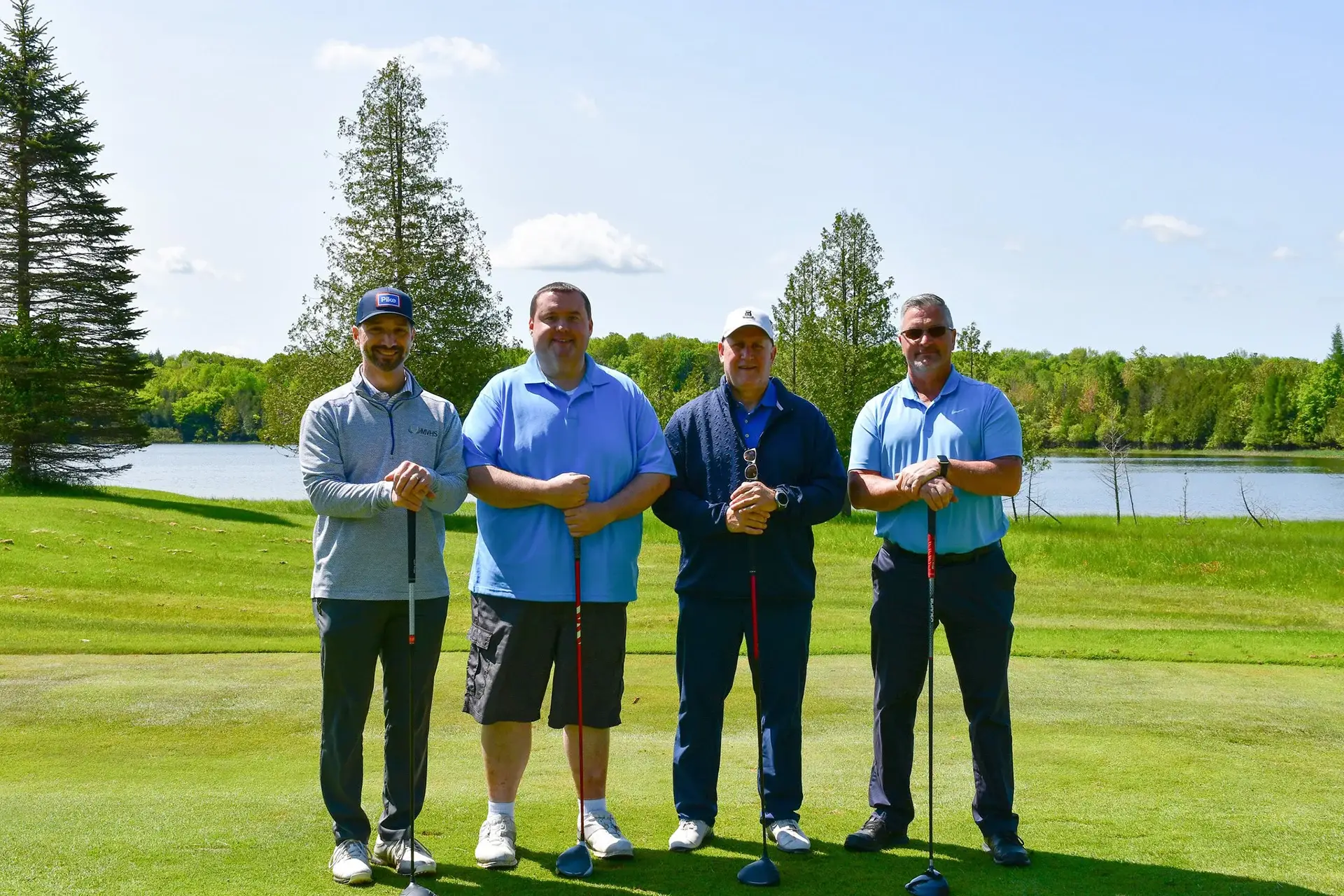 Team Holding Trophies