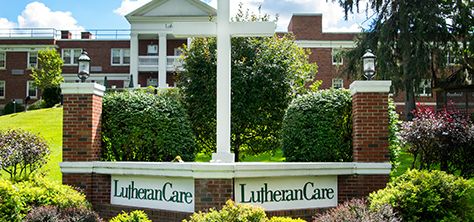LutheranCare outdoor signs and brick building