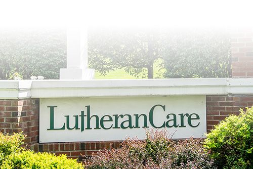 LutheranCare sign on brick wall outside